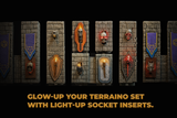A set of fantasy terrain wall panels mounted on a black background, each featuring a stone texture with mounted decorative elements like shields, banners, skulls, and glowing light-up socket inserts. Gold text at the bottom reads: 'GLOW-UP YOUR TERRAINO SET WITH LIGHT-UP SOCKET INSERTS.